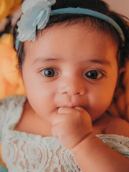 This adorable 3-month-old and her expressions were just the cutest. It's a joy to capture these early milestone moments.