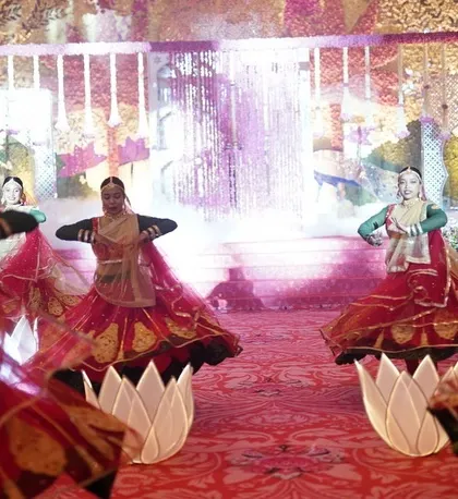 For this varmala, I used dancers with illuminated lotus props to create a beautiful, glowing pathway. The performance was a blend of traditional dance forms with modern elements.