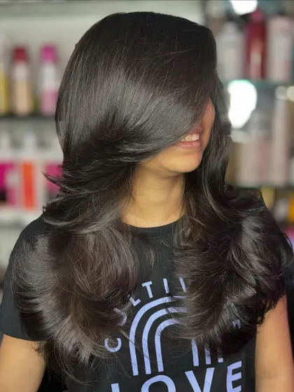 This is what I call a "glow-up". A classic layered haircut that transforms the hair, giving it a full, healthy, and beautifully styled appearance.