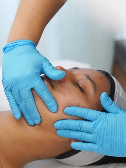The upward strokes during a facial massage are crucial for lifting and firming the skin. This technique helps to contour the jawline and cheeks naturally.