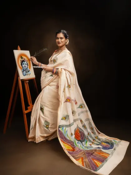 Creating life while painting divinity. This Janmashtami-themed portrait celebrates the beauty of being a creator in every sense, of art, of life, of love.