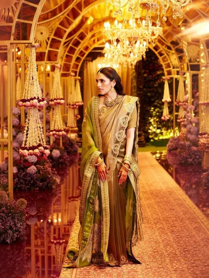 A full-length shot of the beautiful Masaba saree, showing how we used heirloom jewelry to create a look that is both traditional and deeply personal.