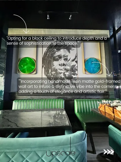 A design breakdown of a corner in the NX Lounge, showing how we used a black ceiling for depth and incorporated handmade resin art to add elegance and a distinctive vibe.