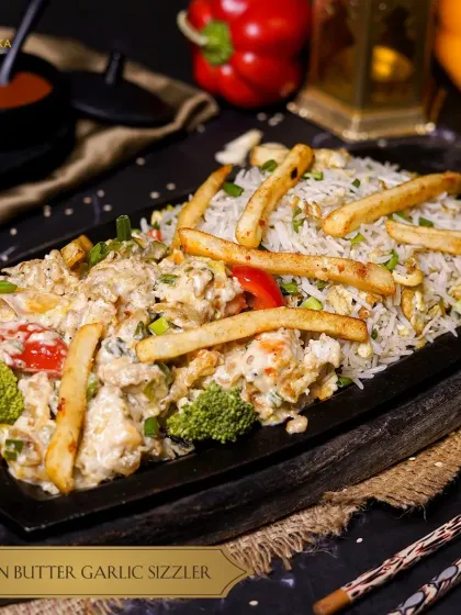 Indulge in our Creamy Chicken Butter Garlic Sizzler, a symphony of flavors that melts in your mouth with a sizzling twist.