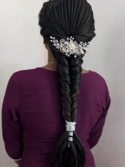 A neat fishtail braid with a beautiful crystal hair accessory. Learning to use accessories effectively is a key part of my course.