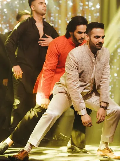 The groom and his friends in a powerful, synchronized pose. I focus on creating strong visual moments like this that look amazing in photos and videos.