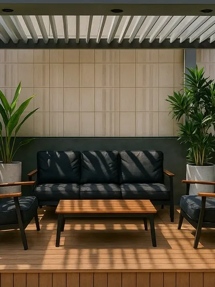 A closer look at the seating under the pergola. The dark furniture contrasts with the light wood deck, and the surrounding planters make the space feel integrated with the garden.