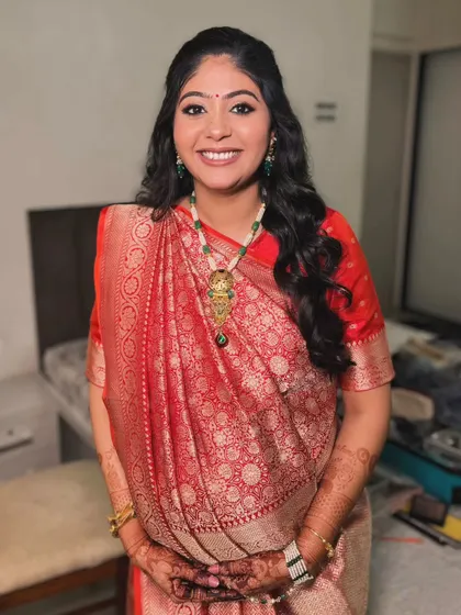 The full look, showing how the traditional attire and classic makeup come together for a timeless and elegant baby shower style.