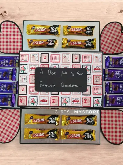 The second layer of the surprise phone gift box, filled with 5 Star and Dairy Milk chocolates. Every layer is a treat!