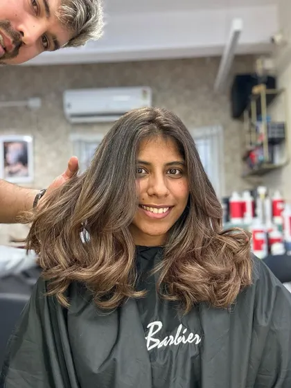 Me with the client, showing off her beautiful new brunette hair.