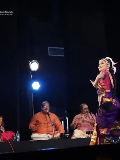 A full view of the stage, showing the musicians on one side and me on the other, illustrating the collaborative nature of a Bharatanatyam recital.
