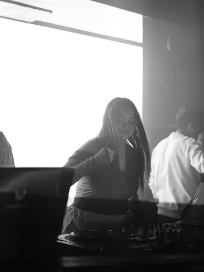 A black and white action shot, capturing my movement and energy while performing.