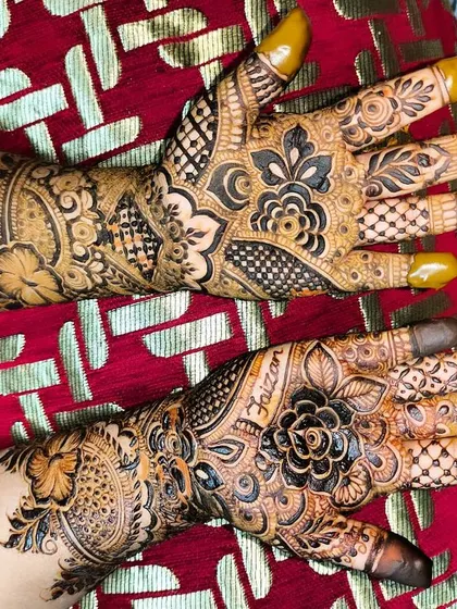 A close-up of the palm, showing a personalized name integrated into the design.