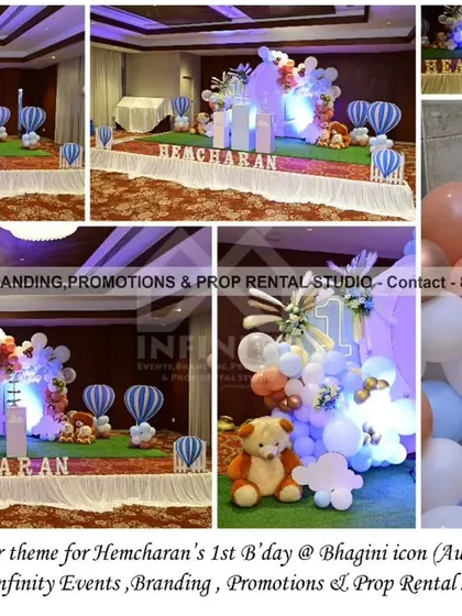 An adorable "Teddy & Hot Air Balloon" theme for a first birthday. The setup includes hot air balloon props, cuddly teddy bears, and a dreamy pastel balloon garland.