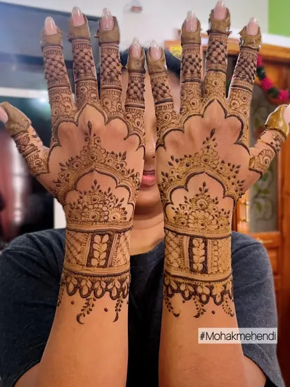 This elegant design features a scalloped edge, giving it a unique and graceful look. The patterns are a mix of traditional bands and delicate dots, perfect for any festive event.