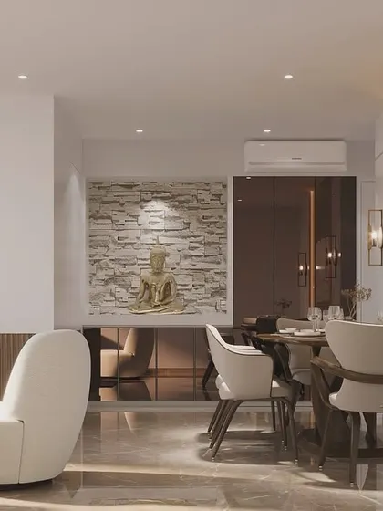 This luxurious living room design seamlessly integrates a serene Buddha statue into a modern setting. The combination of clean lines, reflective surfaces, and spiritual art creates a balanced and sophisticated space.