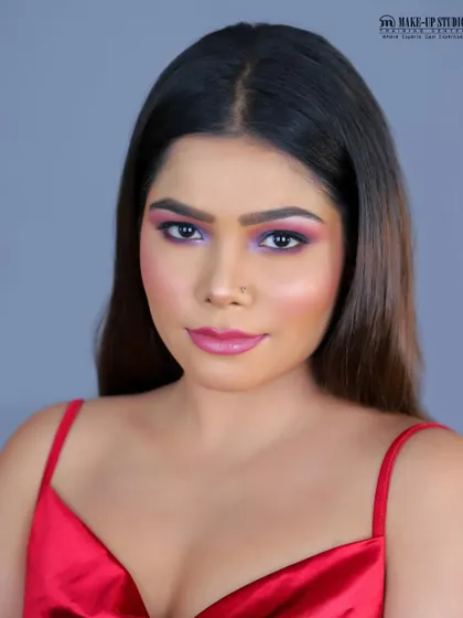 A vibrant pink and purple look created by one of my talented students for their glam assessment. I encourage bold color choices.