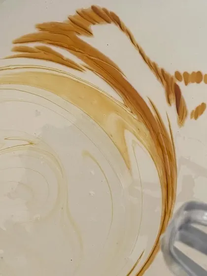 The beautiful, fluid motion of different colored soap batters being swirled together. This is how we create the unique patterns in each bar.