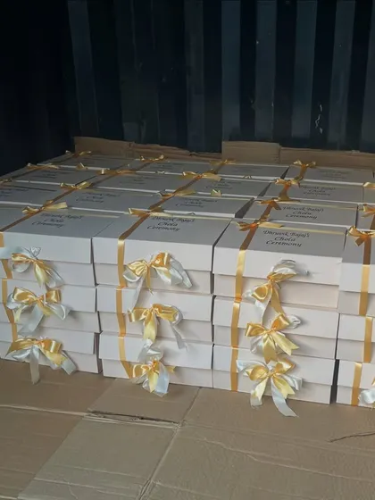 This shows a large bulk order of customized boxes for a Chola ceremony, all packed and ready for dispatch. Even for last-minute orders, we ensure every detail is perfect.