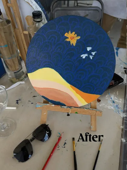 The beautiful "After" shot. This is the finished piece from a private painting party, a lovely landscape created on a round canvas.
