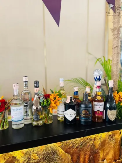 A lineup of top-shelf spirits for a premium wedding bar. We believe in using only the best ingredients, from Hendrick's Gin and Glenfiddich whisky to Dom Pérignon champagne.