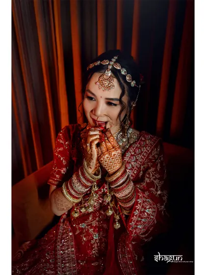 A playful and cute bridal portrait. Her expression is full of joy and a little bit of mischief.
