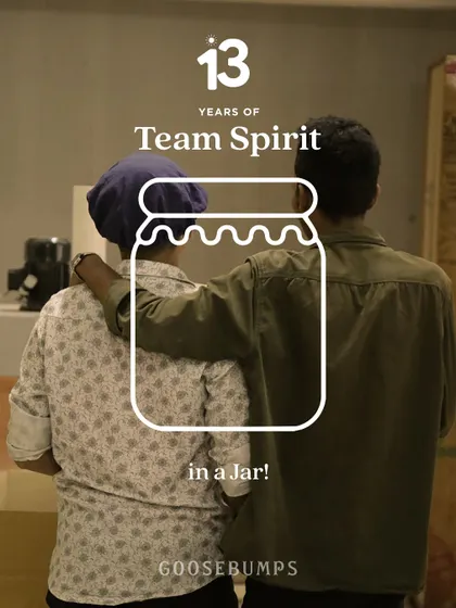 Team spirit is what holds us together. This image of two team members captures the trust and collaboration that is at the core of our work family.