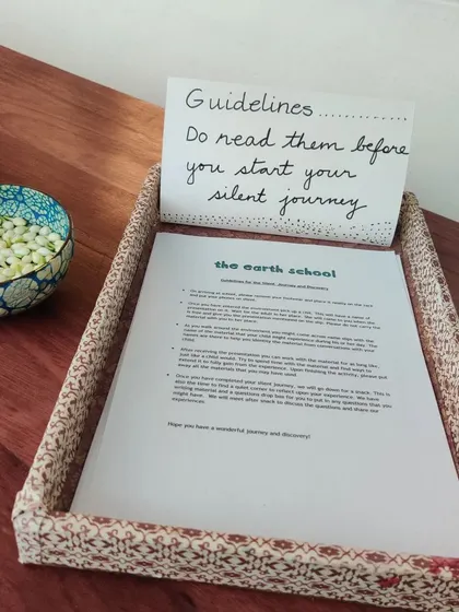 The guidelines for our Silent Journey. We set a clear intention for the experience, allowing parents to fully immerse themselves in the work and observe their own process of discovery without interruption.