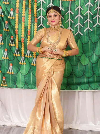 A full-length shot of the bride, looking absolutely regal in her complete bridal attire.