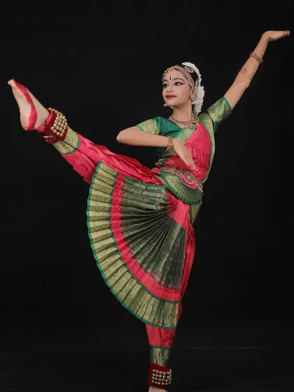 A perfectly captured moment of Tanmayi, showcasing her excellent form and flexibility. Achieving such poses requires not just talent but also consistent practice and physical conditioning.
