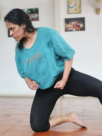 An actor in a powerful pose during a "Gretel" rehearsal.
