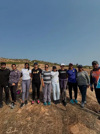 A small group enjoying the vast, open landscape on a hill near Bangalore. Our treks offer a much-needed escape from the city's hustle and bustle.