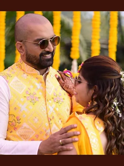 A closer look at the groom's custom waistcoat for the Haldi ceremony. The embroidery directly mirrors the design on the bride's lehenga, creating a perfect match.