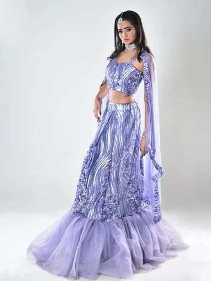 A poised, three-quarter shot displaying the complete engagement look. The makeup is kept elegant and radiant, ensuring the model looks stunning from every angle.