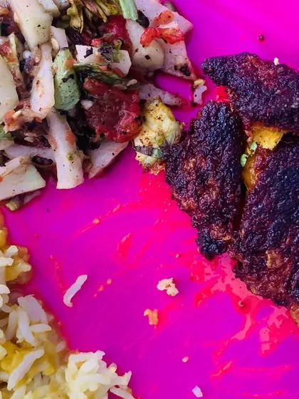 My plate with crispy fried fish, dal, rice, and a fresh salad.