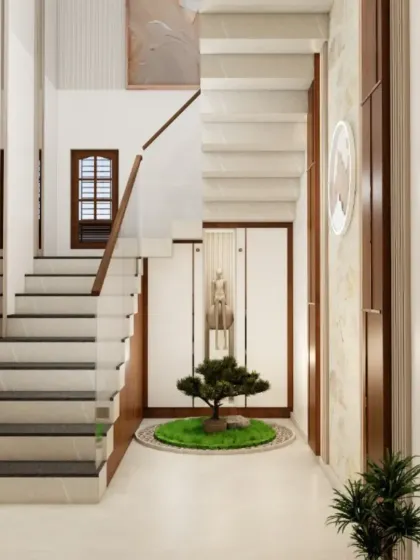 A render of a staircase with a beautiful zen garden underneath, showcasing a creative use of under-stair space.