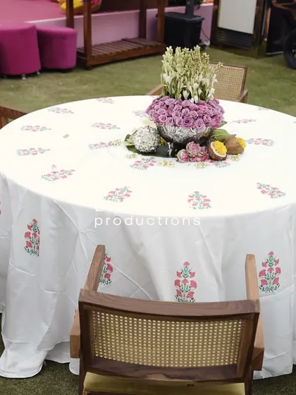 A close-up of a guest table, ready for the Haldi celebration.