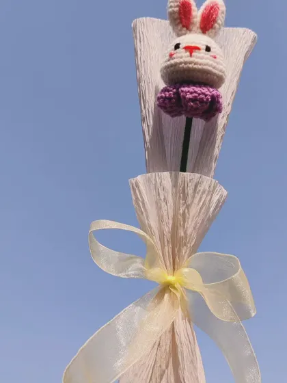 A single-stem bunny bouquet, a perfect return gift idea.