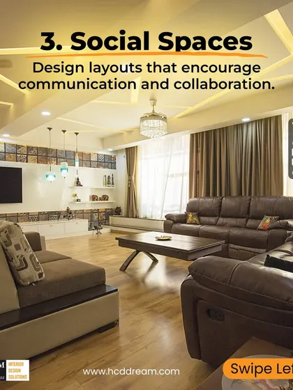 We design social spaces that encourage communication. This open-plan living room features comfortable, facing sofas and a central coffee table, creating a perfect setup for conversation and collaboration.