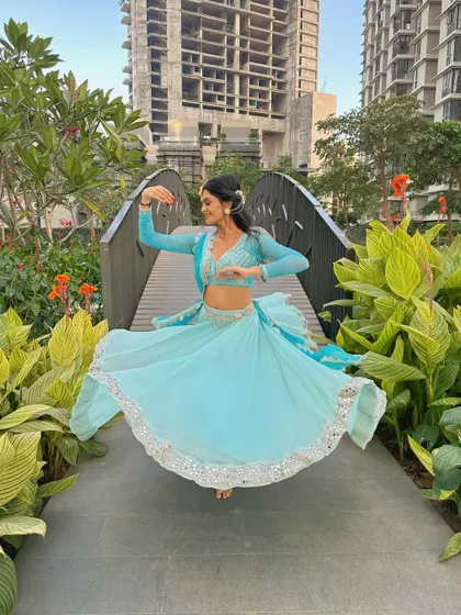 A dynamic pose showing the energy and motion of a semiclassical piece, even in a still photograph.