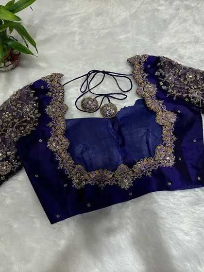 If extra had a royal cousin, this blouse would be it. Dark, detailed, and dangerously beautiful.