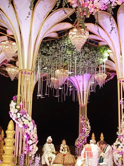 The stunning wedding mandap set up on the beach, a dream setting for a musical phere.