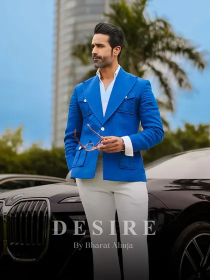 I believe in creating clothes that match your ambition. This vibrant blue summer blazer is tailored from a premium, breathable fabric and designed with a sharp, powerful silhouette for a look that is both classic and confident.