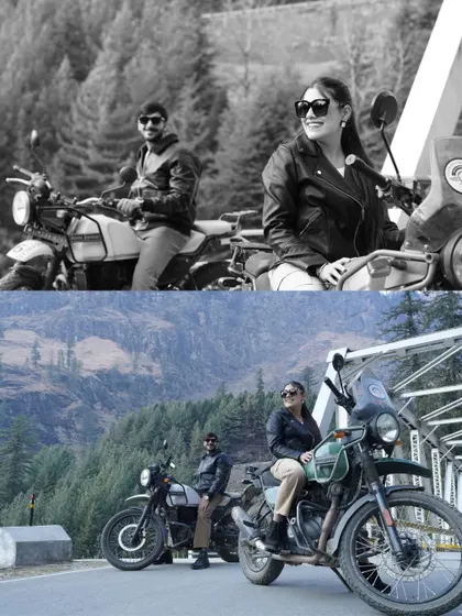 A cool, adventurous shot of the couple on Royal Enfield Himalayan bikes on a bridge in Manali, perfect for couples who love to ride.