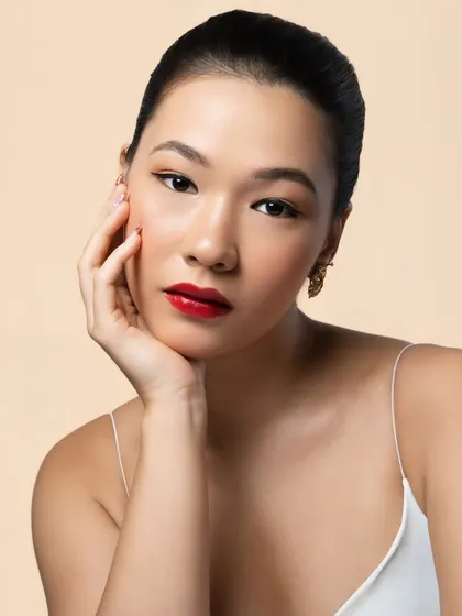 A portrait of timeless elegance. I used products from MAC and Forever52 to achieve this flawless skin, sharp winged liner, and a statement red lip that is perfect for any glamorous event.