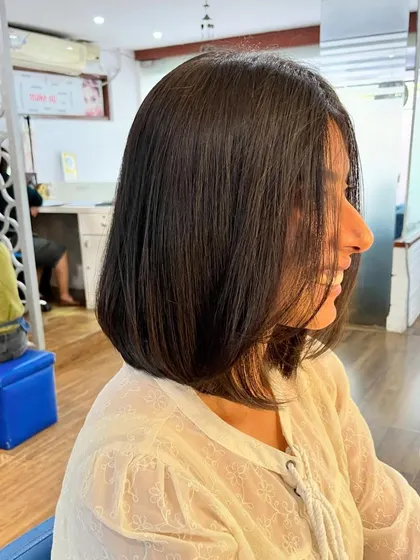 The angled bob is longer in the front and shorter in the back.