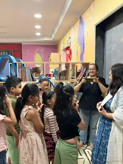 The children are all ears during our Gol Gappa story session. Interactive storytelling like this helps build listening skills and vocabulary.