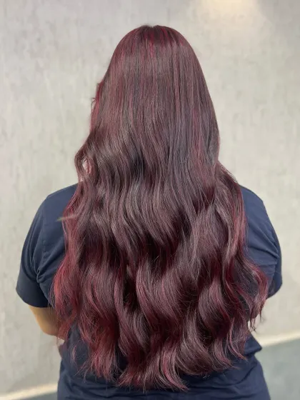 Red hair, don't care. This is a perfect Christmas-inspired red, deep and festive, styled with beautiful waves.