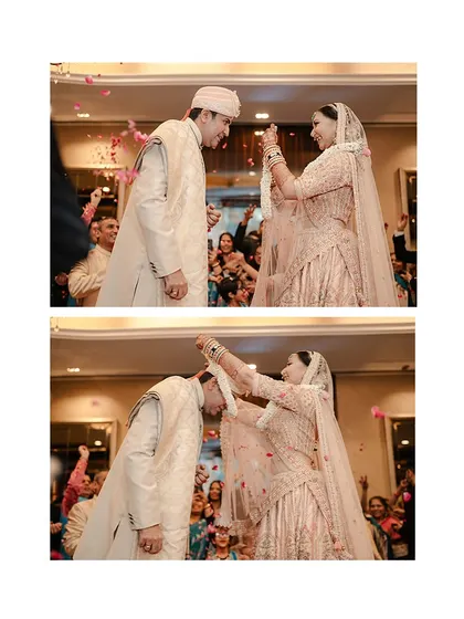 The playful struggle and ultimate success of the Varmala ceremony. We capture the entire sequence, full of laughter and cheering.