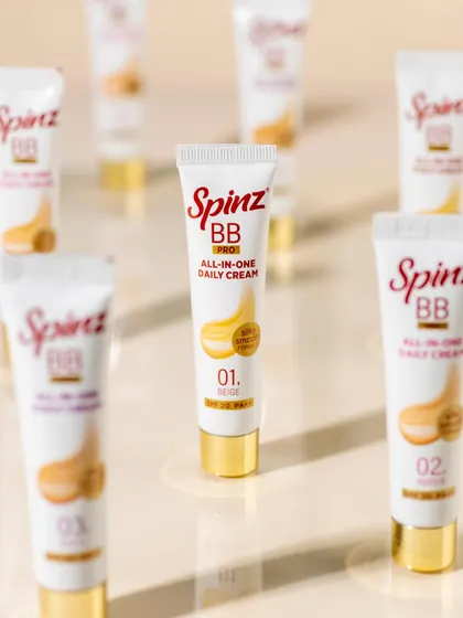 A creative shot of Spinz BB cream using repetition and depth of field. Placing one tube in sharp focus while others fade into the background creates a dynamic and professional look.